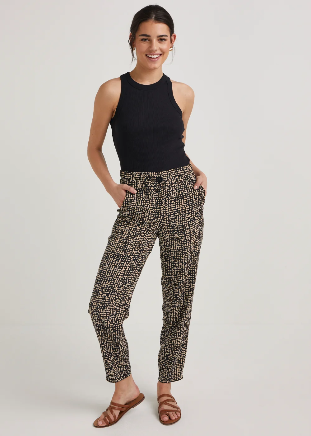 Black Print Tapered Trousers - Size 8 Image 1
