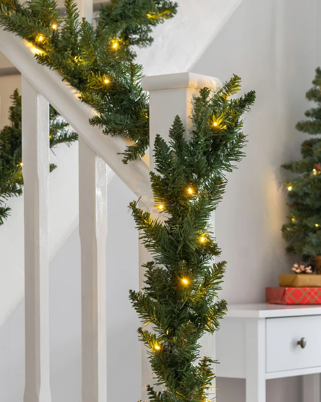 WeRChristmas Green Pre-Lit Plain Artificial Christmas Garland 80 Warm White Leds 18 Ft