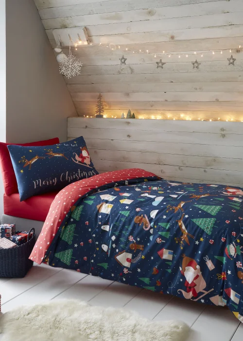 Catherine Lansfield Kids Bedding Santa's Christmas Wonderland Glow in the Dark Duvet Cover Set - Single Image 1