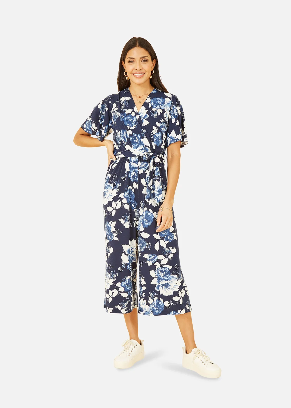 Mela Rose Print Jumpsuit With Angel Sleeves In Navy - Size 8 Image 1