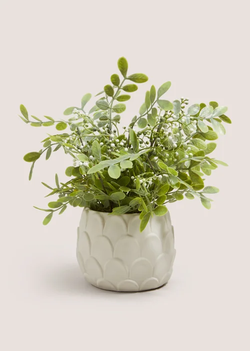 Green Plant In Artichoke Pot Image 1