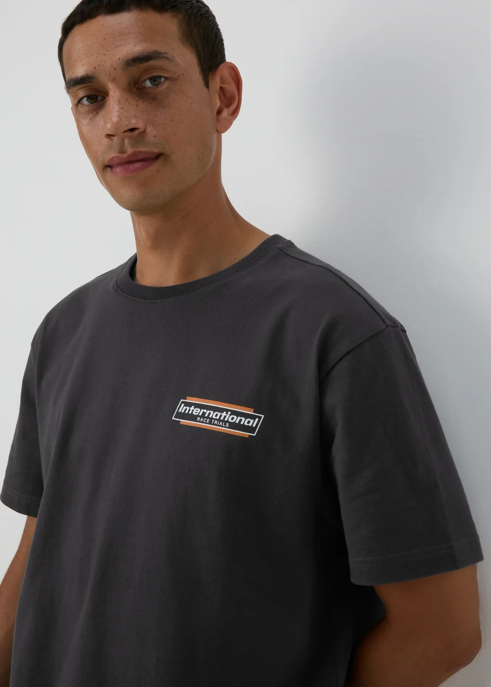 Black International T-Shirt - S Image 1