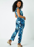 Roman Blue Petite Tropical Print Tie Waist Jersey Jumpsuit - Size 12 Image 1