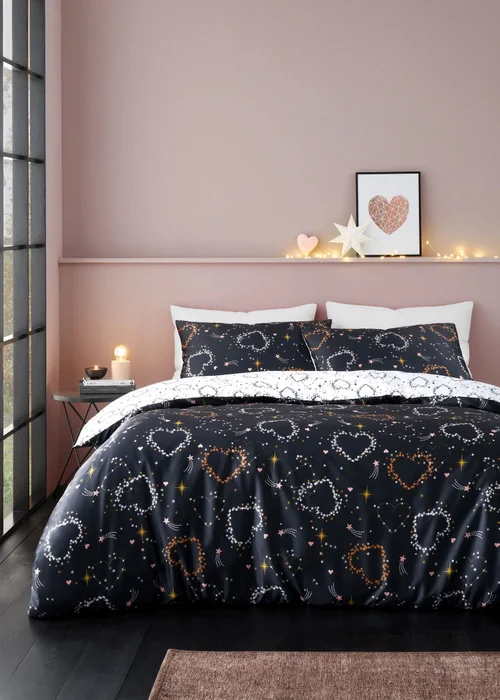 Catherine Lansfield Cosmic Hearts and Stars Reversible Duvet Cover Set - Single Image 1