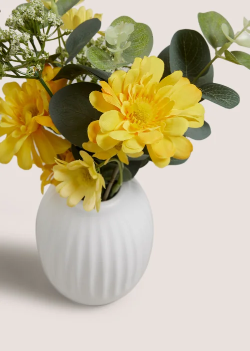 Yellow Flowers In A Rib Vase Image 2