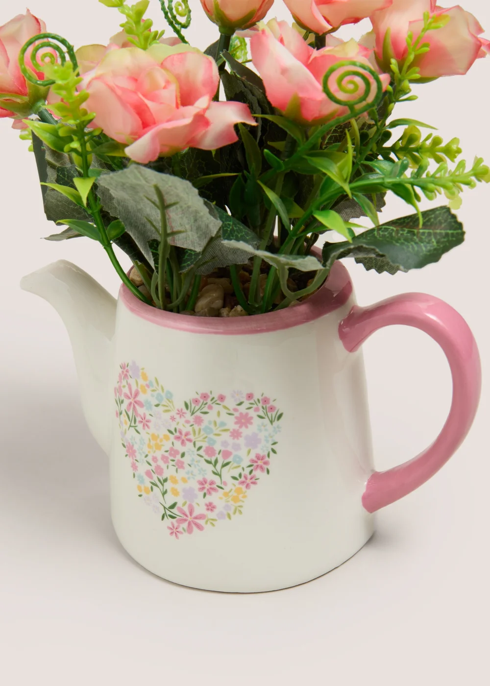 Pink Flower In Watering Can Image 2