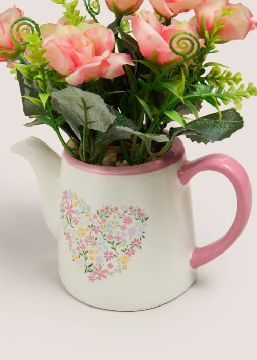 Pink Flower In Watering Can Image 2