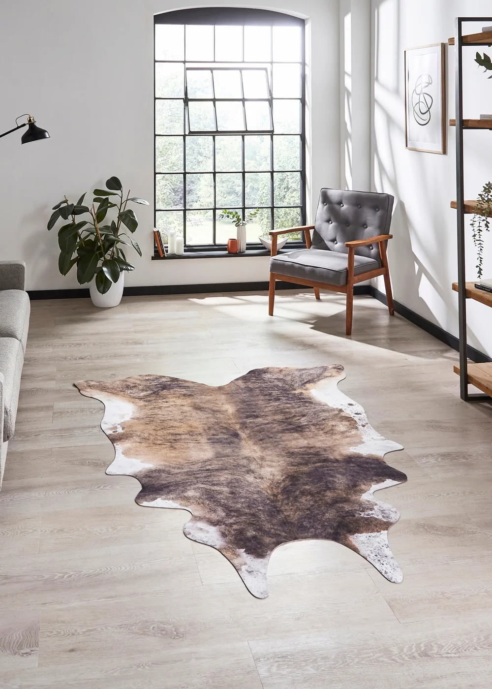 Think Rugs Faux Cow Print Brown Animal Print Rug - 130 x 155 Image 1