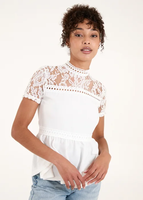 Blue Vanilla Ivory Lace Trimmed Peplum Top - 8 Image 1
