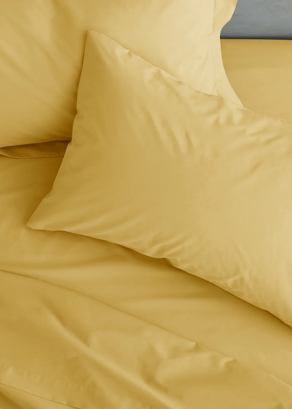 Catherine Lansfield Easy Iron Percale Standard Pillowcase Pair Yellow - 50 x 75cm Image 1