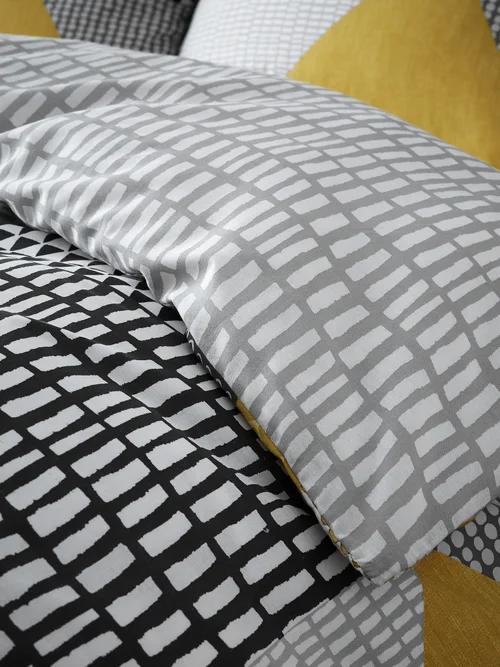 Catherine Lansfield Larsson Geo Reversible Duvet Cover Set Ochre Yellow - Single Image 4