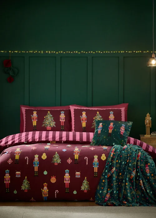 Catherine Lansfield Plum Christmas Nutcracker Stripe Reversible Duvet Cover Set - Single Image 1