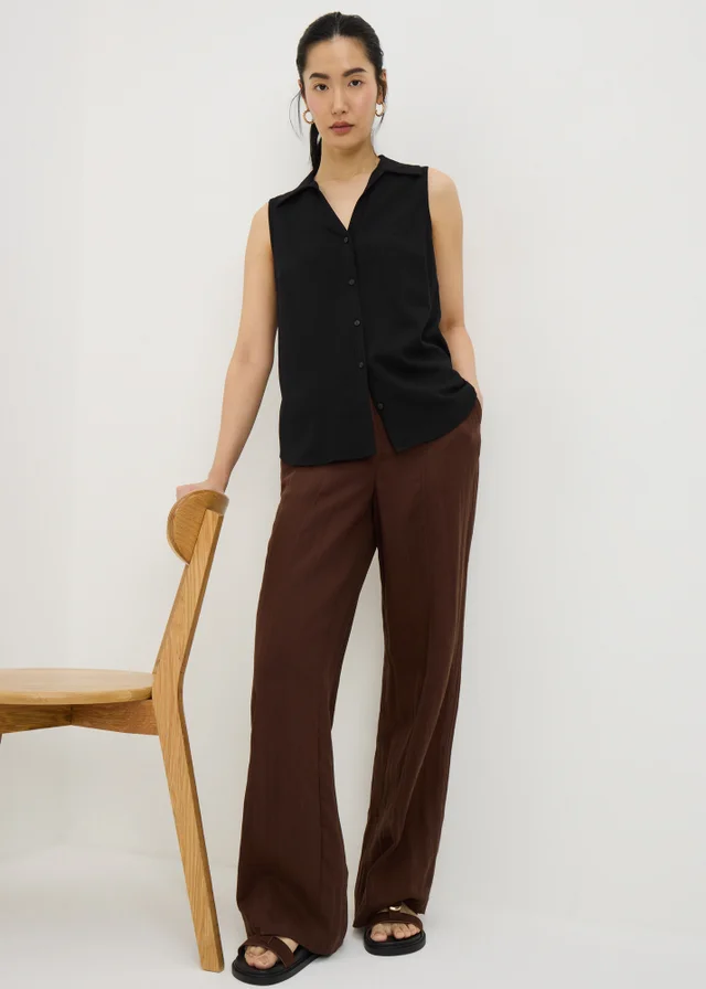 Black Sleeveless Clipper Shirt