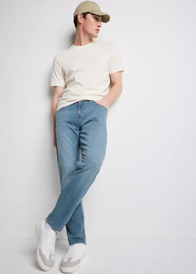 Mid Wash Tapered Fit Jeans