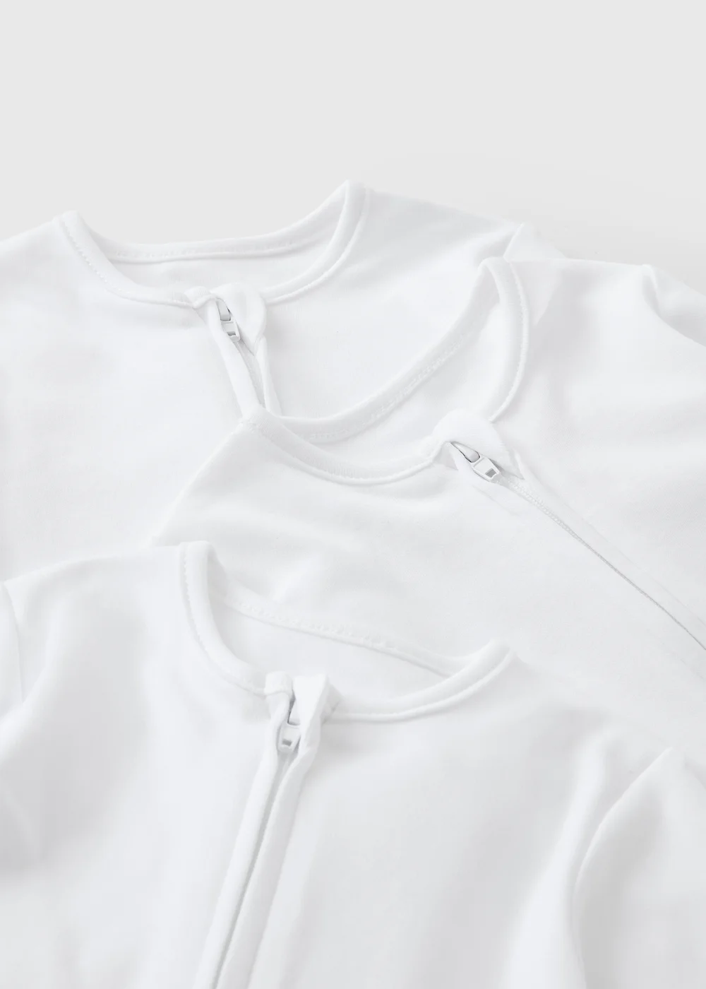 3 Pack Baby White Plain Zip Up Sleepsuits (0-23mths) - 6-9 months Image 2