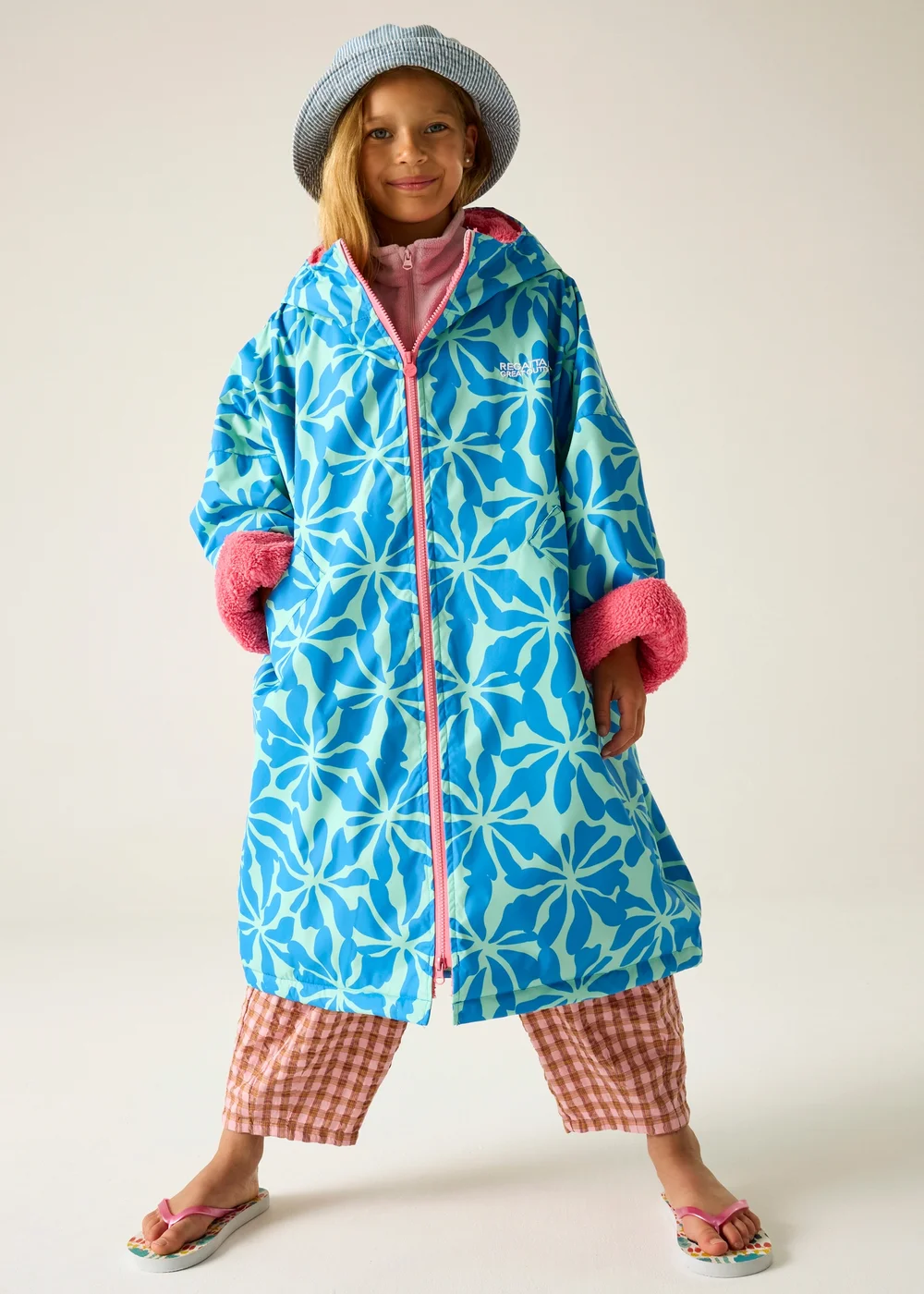 Regatta Blue Floral Pink Lemonade Junior Waterproof Robe with Hydrafort Technology (3-13 Years) - 3-5 Image 1