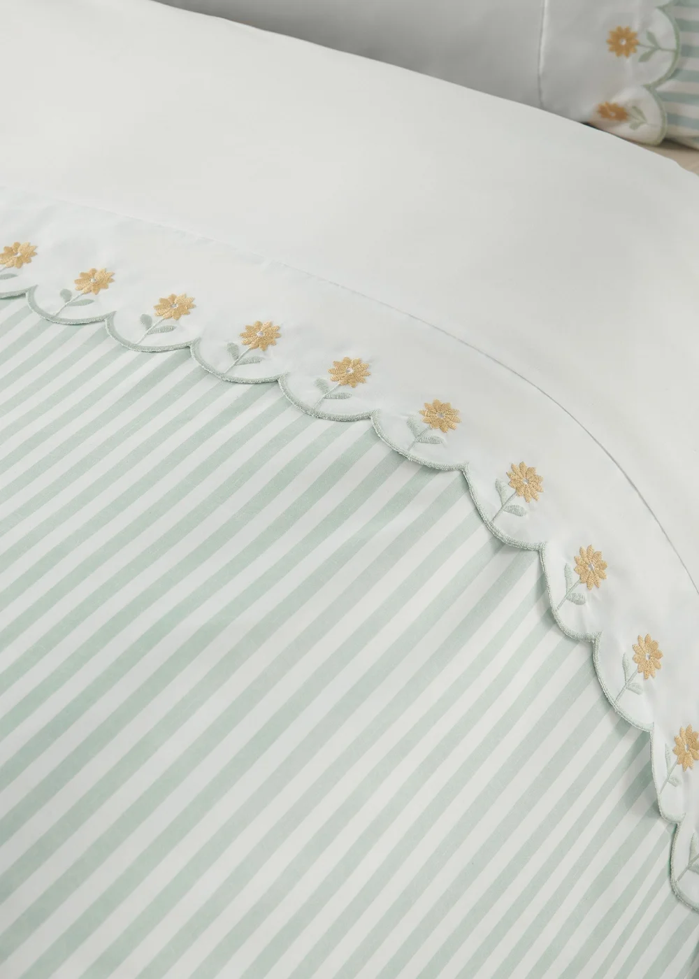 Catherine Lansfield Embroidered Daisy Soft Touch Duvet Cover Set Sage Green - Single Image 3