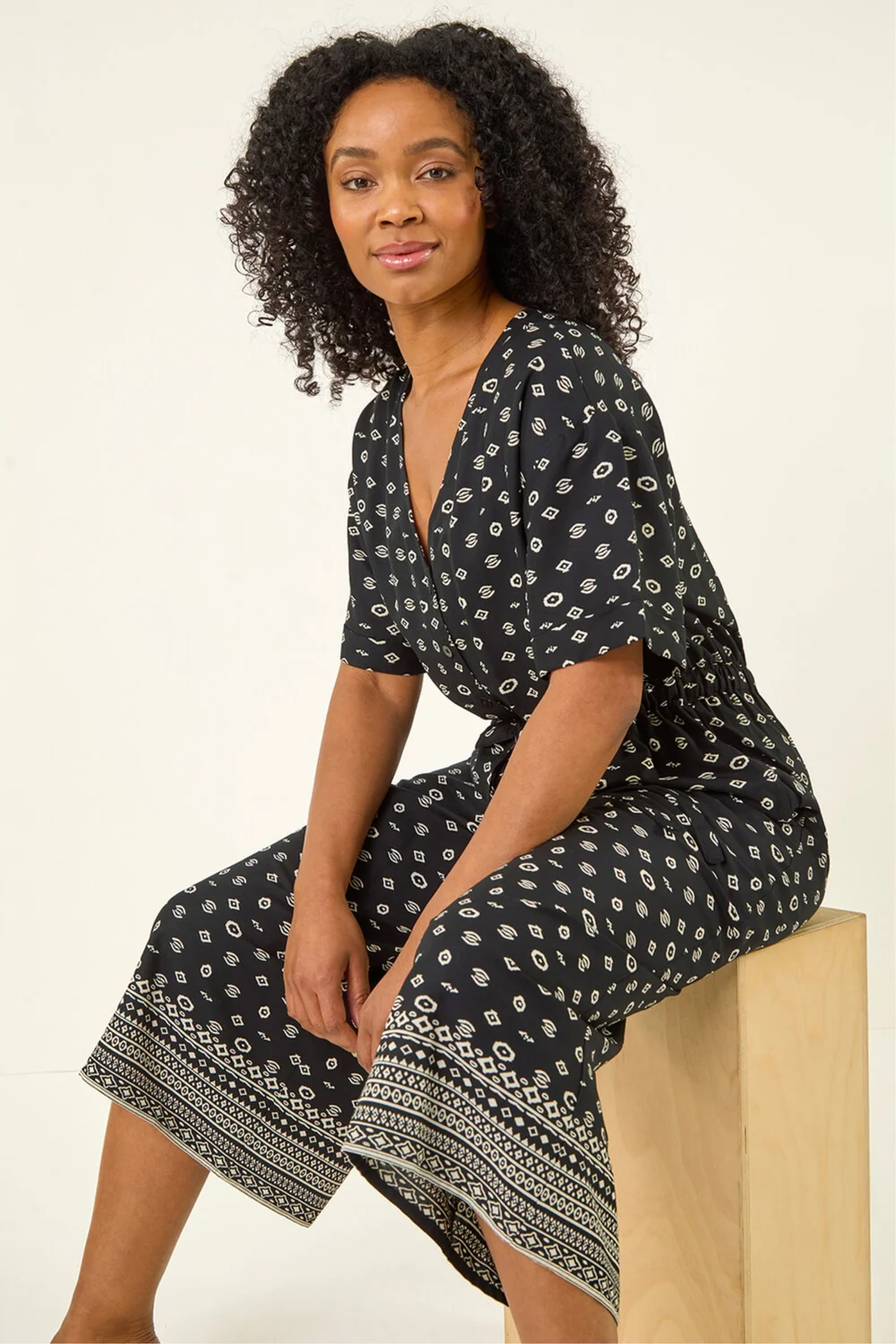 Roman Black Petite Border Print Cropped Jumpsuit - 8 Image 1