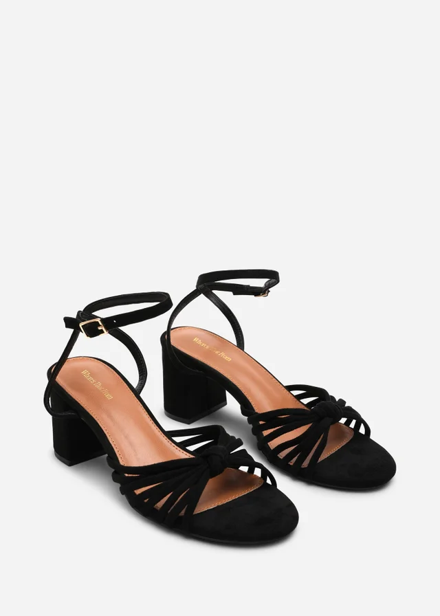 Where's That From Blossy Knotted Block Heel Sandal With Ankle Strap In Black Suede