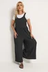 Yours Curve Black Polka Dot Textured Jumpsuit - 30-32 Image 2