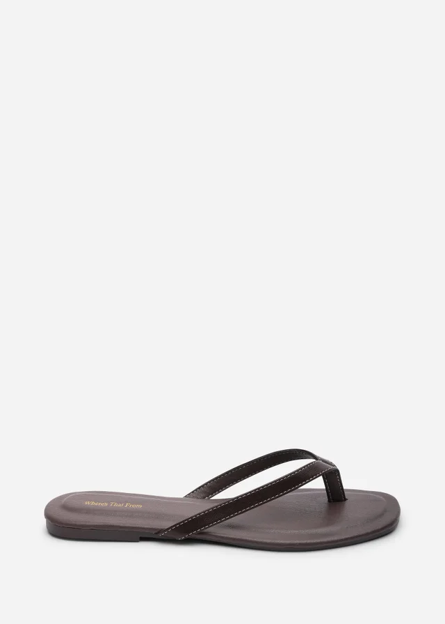 Where's That From Arrow Dark Brown Flip Flop Sandal With Contrast Stitch Detail
