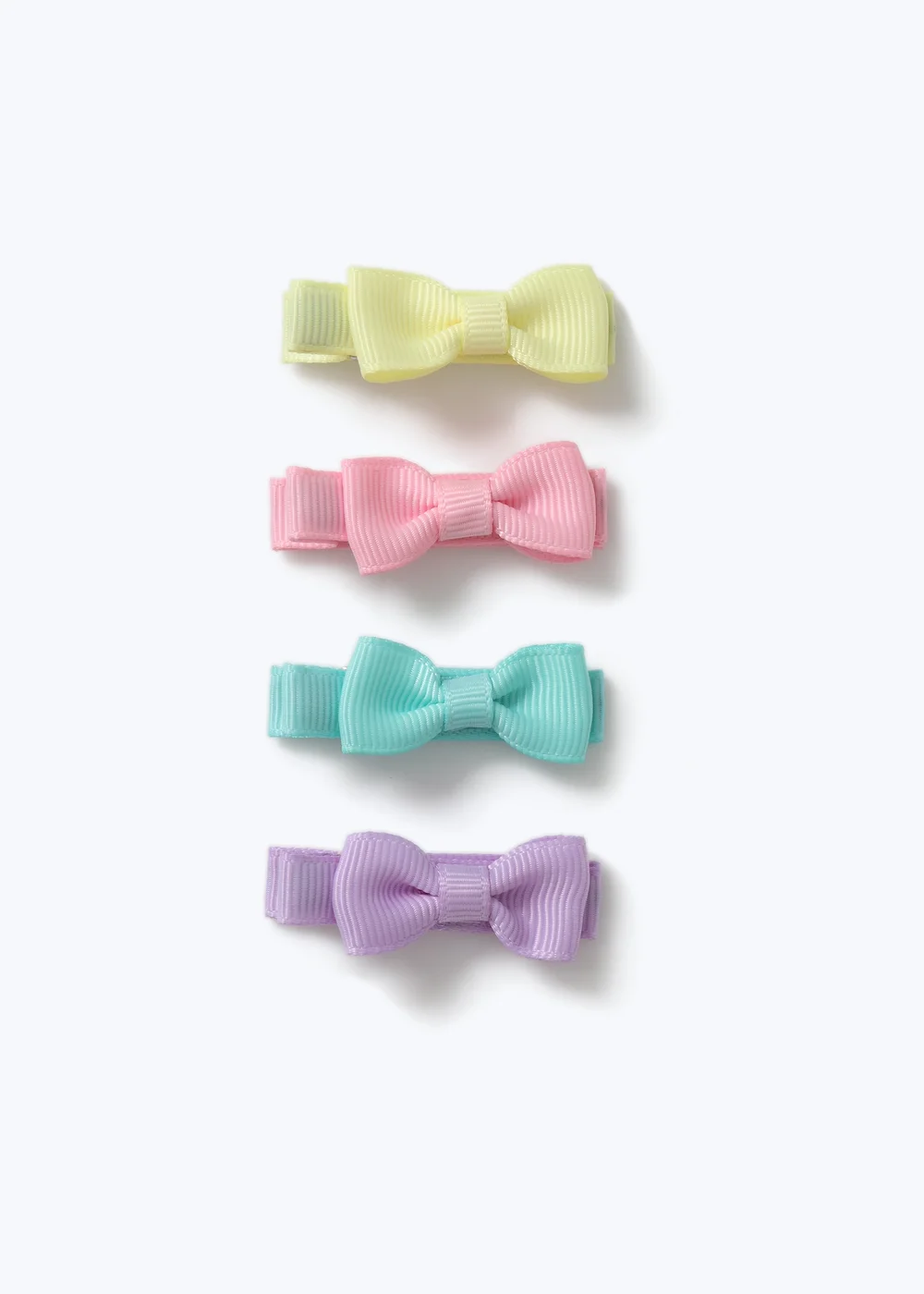 4 Pack Muse Pastel Bow Slide Clips - One Size Image 1