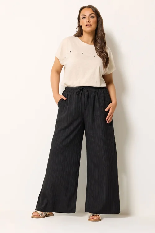 Yours Curve Black Wide Leg Textured Trousers - 18/L30 Image 1