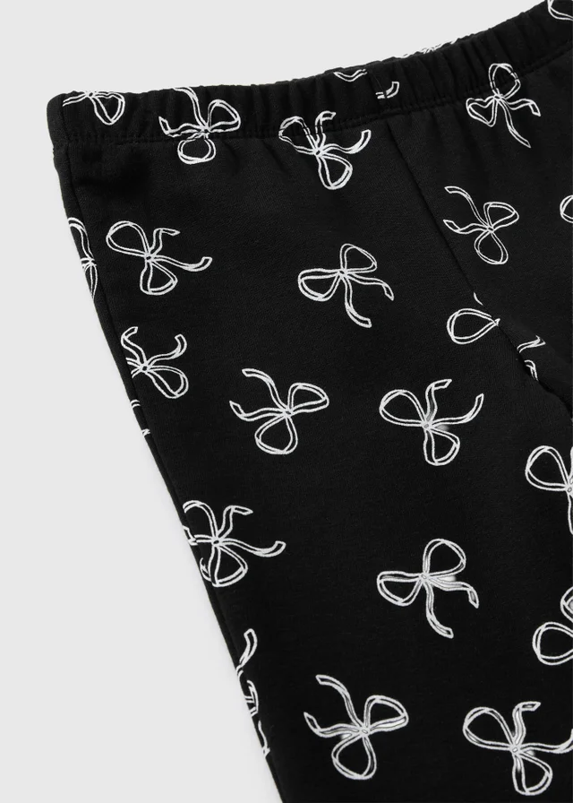 Girls Black Bow Print Flared Leggings (1-8 Yrs)