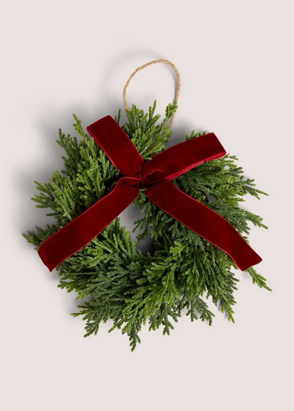 Red Ribbon Tied Mini Christmas Wreath Image 1