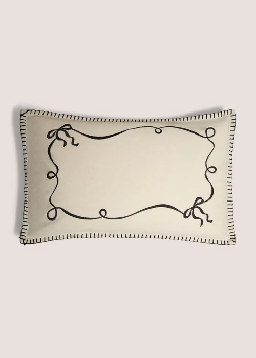 Black Christmas Bow Cushion Image 1