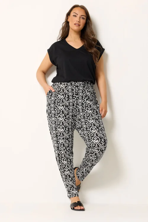 Yours Curve Black Ikat Print Harem Trousers - 16/L30 Image 2