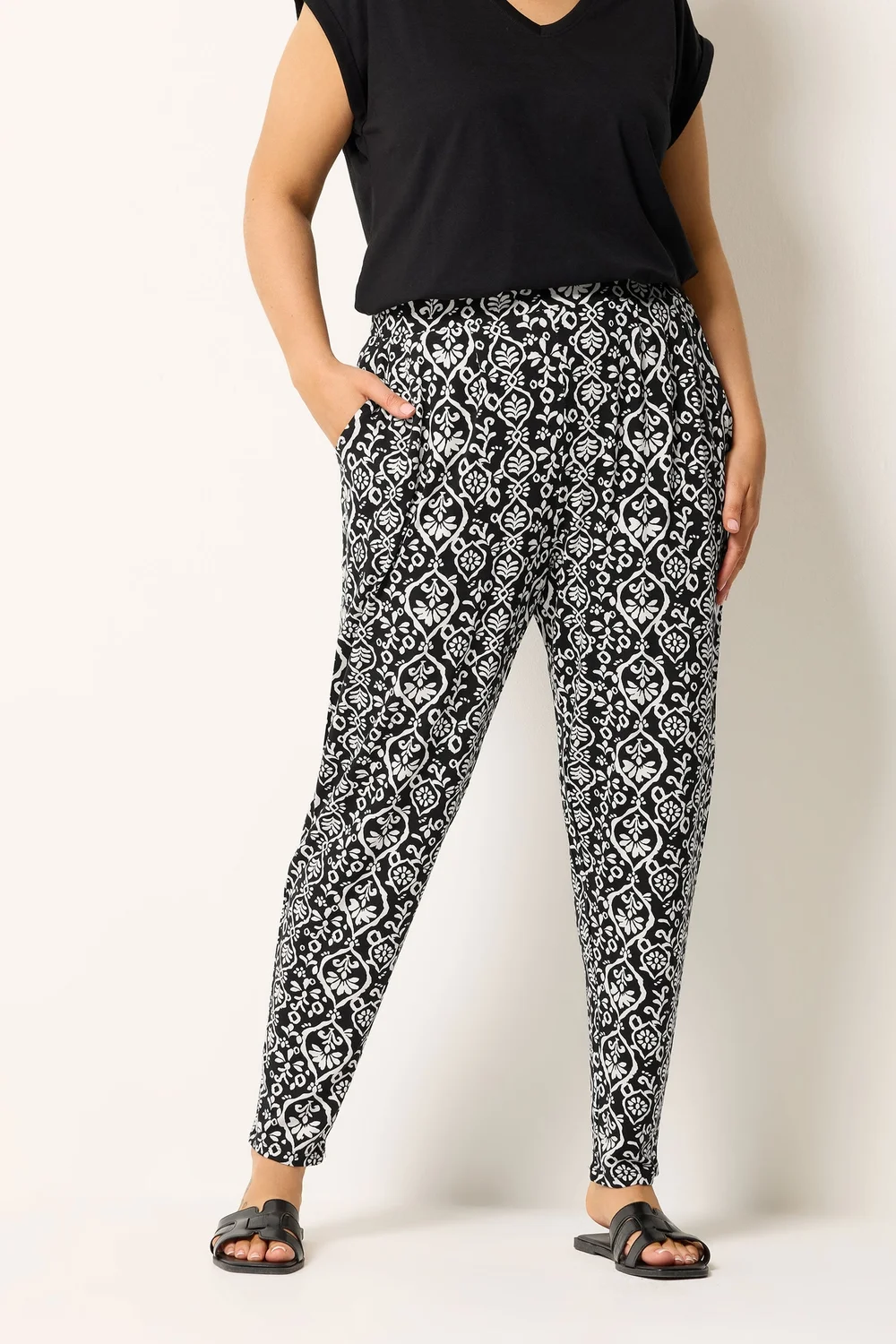 Yours Curve Black Ikat Print Harem Trousers - 16/L30 Image 1