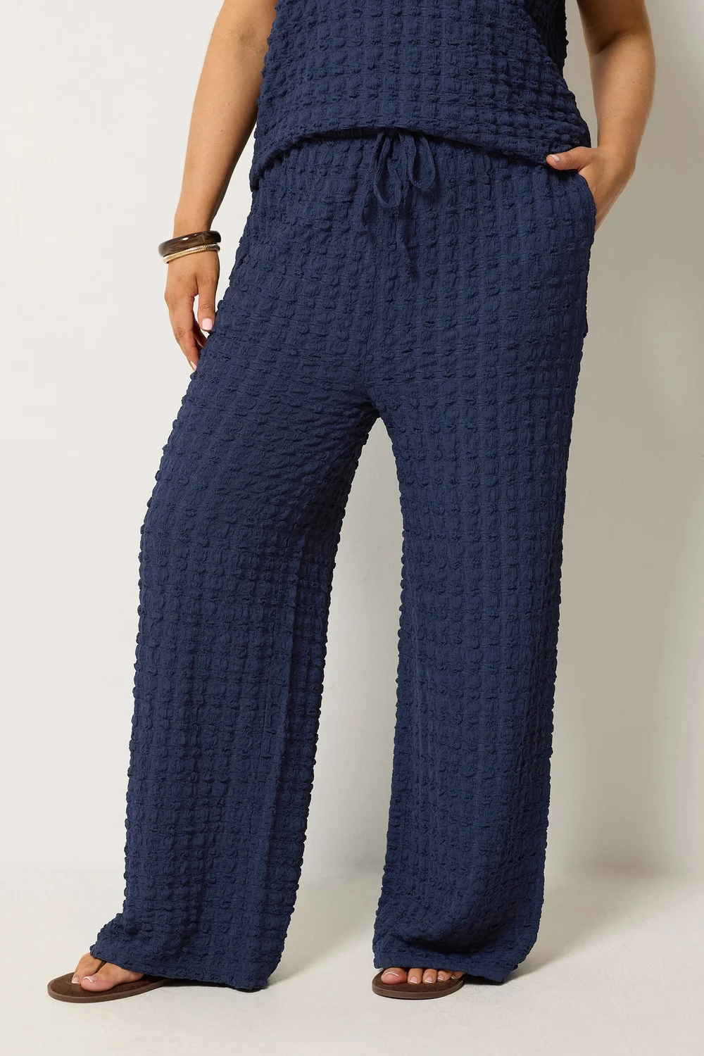 Yours Curve Navy Blue Bubble Textured Wide Leg Trousers - 14/L28 Image 1