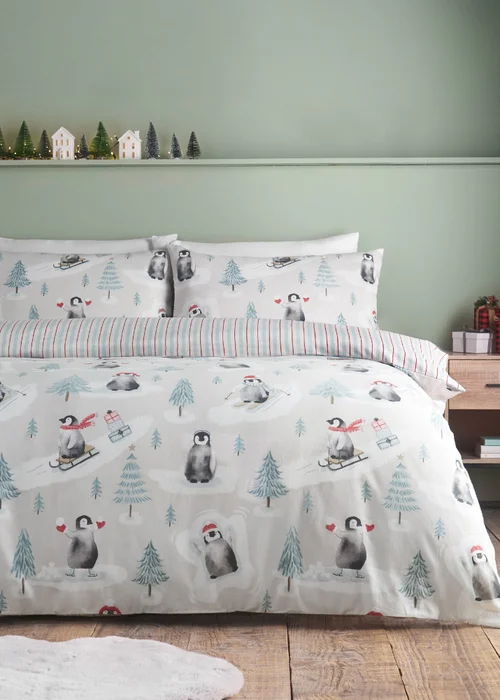 Catherine Lansfield Brushed Christmas Penguins Cotton Reversible Duvet Cover Set Green - Single Image 1