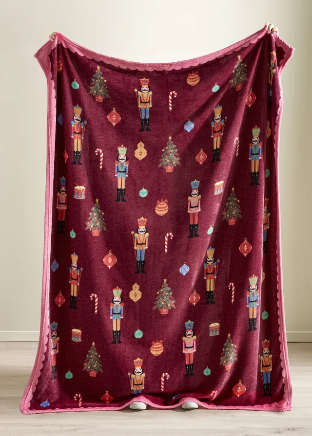 Catherine Lansfield Christmas Nutcracker Fleece Cosy 130x170cm Blanket Throw Plum