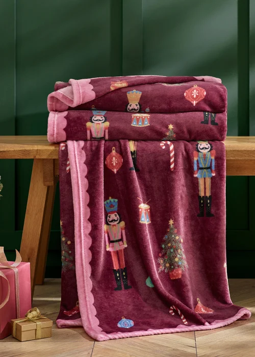 Catherine Lansfield Christmas Nutcracker Fleece Cosy 130x170cm Blanket Throw Plum - One Size Image 1