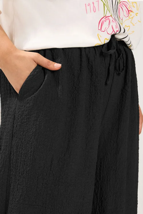 Yours Curve Black Texture Wide Leg Trousers - 18/L28 Image 4