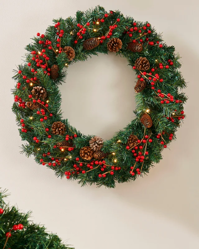 WeRChristmas Red Pre-Lit Artificial Christmas Wreath With Pinecones And Red Berries 50 Warm White Leds 76 Cm