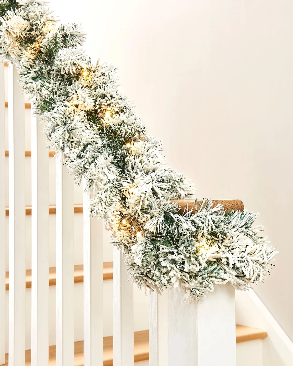 WeRChristmas Green And White Pre-Lit Snow-Flocked Spruce Artificial Christmas Garland 20 Warm White Leds 9 Ft - No Size Image 4