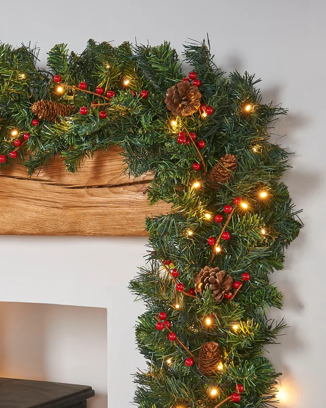 WeRChristmas Green Pre-Lit Extra-Thick Artificial Christmas Garland With Pinecones And Berries 80 Warm White Leds 9 Ft