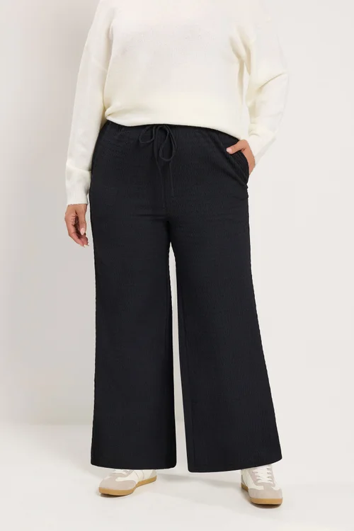 Yours Curve Black Textured Drawstring Trousers - 20/L30 Image 1