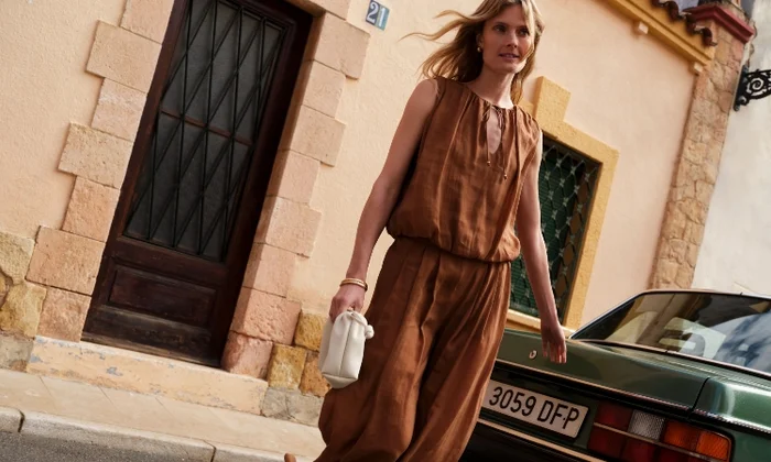 Women wearing elasticated waist jumpsuit.