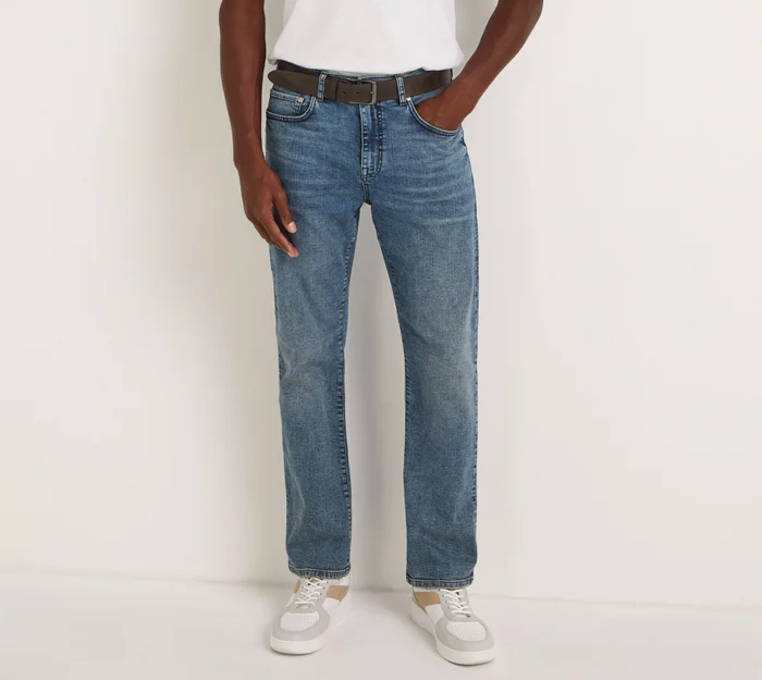 man in white t shirt and jeans