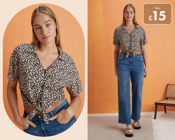 Woman wearing a leopard print blouse with a pair of wide leg jeans and white buckle sandals.